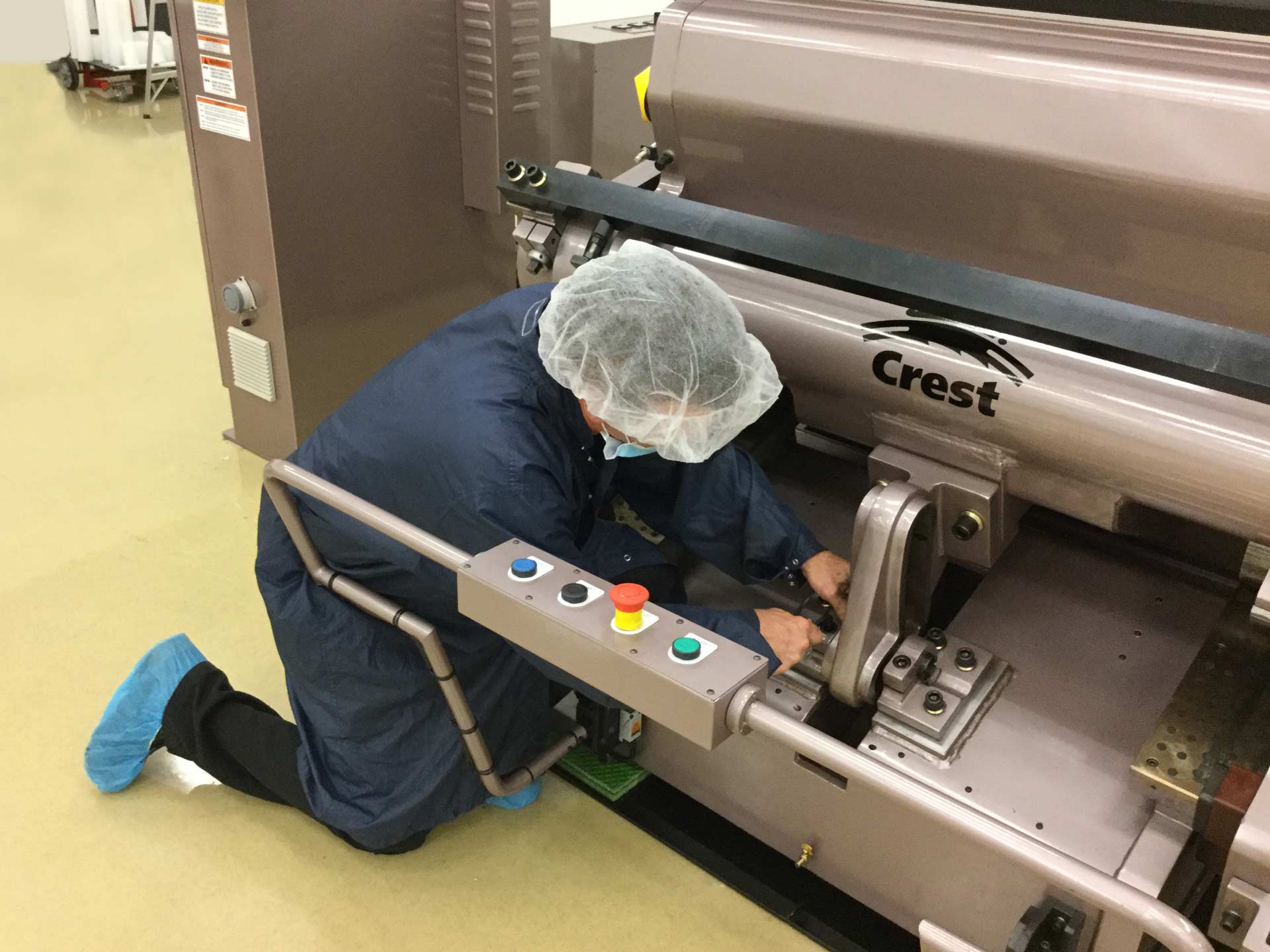 Expert Die Cutting Machine Repair Services That Save You Time and Money - Technician performing die cutting machine repair